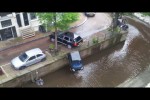 Video - Stolen Porsche Cayenne pushes Smart into Canels of Amsterdam